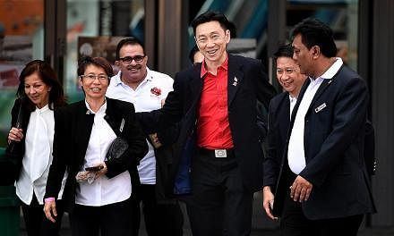 Mr Bill Ng (in red shirt) with (from left) vice-president nominees Annabel Pennefather and Teoh Chin Sim, supporters Suresh Nair and Francis Lee, and former national goalkeeper and council member nominee Shahri Rahim.