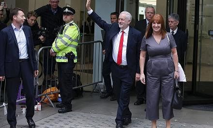 Labour leader Jeremy Corbyn, who began the campaign with historically low favourability numbers, acknowledging supporters as he left the party headquarters in central London yesterday after his stunning comeback.