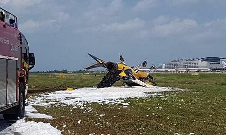 The damaged Black Eagles plane at Changi Airport on Tuesday after it skidded while taking off.