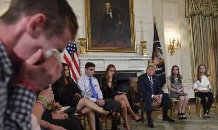 Sam Zeif, a student at Marjory Stoneman Douglas High School, weeping as he recounted his story of the shooting last week as other students, teachers and President Donald Trump listen, at the White House on Wednesday. The teen described texting his fa