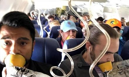 Passengers on board the Dallas-bound Southwest Airlines flight from New York, which made an emergency landing. After an engine on the plane's left side blew, it threw off shrapnel, shattering a window and causing cabin depressurisation that nearly pu