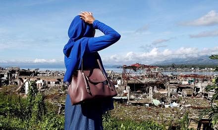 A view of ruined houses in Marawi City, one year after the Maute Group launched an attack on the Philippine city. A consortium composed of five Chinese firms and four Filipino partner companies has submitted a master plan for rebuilding the conflict-