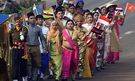 Indian volunteers holding the national flags of Asean countries during India's 69th Republic Day Parade in New Delhi on Jan 26 this year. South-east Asian nations will determine whether the vast Indo-Pacific is governed by the rule of law or the use 