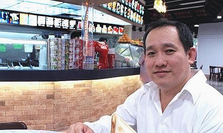 Mr Lim Bee Huat, seen here in an old file photo, started working as a coffee boy when he was nine. Today, his Kopitiam Investment has foodcourts, coffee shops and hawker centres islandwide, including flagship outlet Lau Pa Sat.