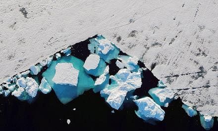 A glacier’s collapse in Greenland shows the impact of climate change. The Arctic could see ice-free summers at least once every decade in a 2 deg C world, versus once in a century at 1.5 deg C. 