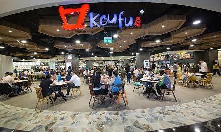 Koufu's foodcourts serve their purpose of feeding the masses and can be found in places like malls and tertiary institutions. Top: Warung K's arang ayam bakar has a smoky aroma. Above: Soon Heng's rojak is full of ingredients.