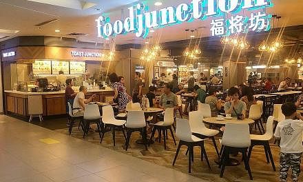 The Food Junction foodcourt at Nex. The chain takes some pains to make its foodcourts look chic and contemporary. Pillowy kueh from Chinatown Tan's TuTu Coconut Cake.