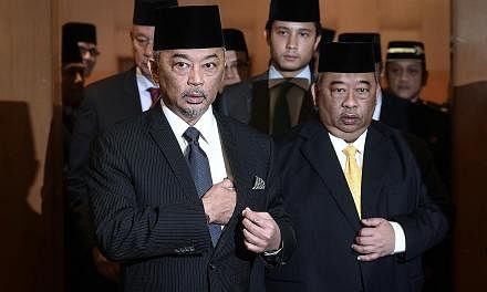 Due to his poor health, Pahang's incumbent ruler Sultan Ahmad Shah had been expected to abdicate in favour of his son Tengku Abdullah Sultan Ahmad Shah (left). The Regent's younger brother, Tengku Abdul Rahman Sultan Ahmad Shah, is seen beside him.