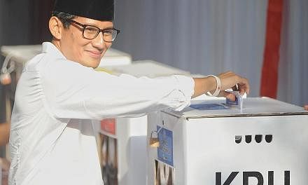 Vice-presidential candidate Sandiaga Uno casting his vote at a polling station in South Jakarta last week.