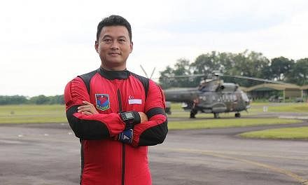 This National Day, Second Warrant Officer Russell Ong will free-fall with eight fellow Red Lions from a height of over 3,000m to land on the Padang.