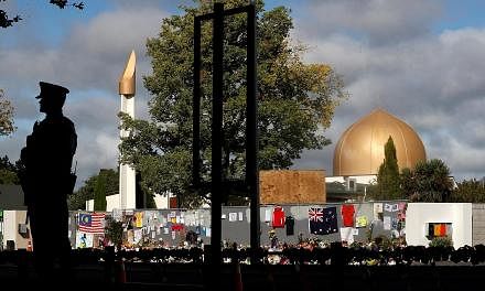 Al Noor Mosque (left) was one of two places in Christchurch targeted by a white supremacist gunman who killed 51 people and injured dozens on March 15. In the wake of the shooting, New Zealand Prime Minister Jacinda Ardern (above) met members of the 