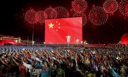 Performers at an evening gala in Beijing's Tiananmen Square to mark the 70th founding anniversary of the People's Republic of China on Oct 1.