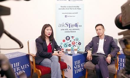 Straits Times travel correspondent Clara Lock and Singapore Tourism Board chief executive Keith Tan at askST@NLB's second November session. Mr Tan hopes that Singaporeans will "take the time to slow down, step out and be proud of this beautiful littl