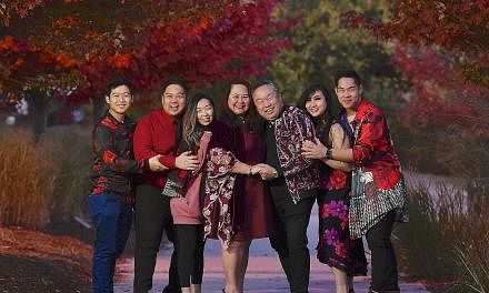 The Lai family all dressed up for Chinese New Year in Ontario, Canada, where they live. From left: Joel, 24; Ryan, 28, with his wife Jaime, 28; Mrs Marianne Lai and her husband David, both 60; Desiree, 21; and Justin, 26.