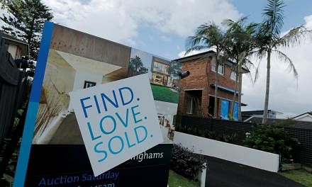 <p>FILE PHOTO: A for-sale sign indicates a residential property sold on the open market on the north shore suburbs of Sydney, Australia, April 4, 2017.   REUTERS/Jason Reed/File Photo</p>