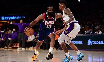 <p>Dec 25, 2021; Los Angeles, California, USA; Brooklyn Nets guard James Harden (13) moves the ball against Los Angeles Lakers guard Malik Monk (11) during the first half at Crypto.com Arena. Mandatory Credit: Gary A. Vasquez-USA TODAY Sports</p>