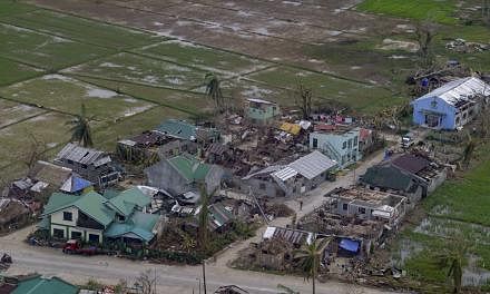 <p>epa09654711 A handout photo made available by the Presidential Photographers Division (PPD) shows areas affected by typhoon Rai in Dinagat Islands, southern Philippines on 22 December 2021 (issued 23 December 2021). Philippine National Police data show
