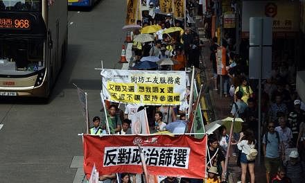 Organisers say about 1,300 supporters took part in the two-hour march from Causeway Bay to the chief executive's office in Admiralty district yesterday, but police put the turnout at 760.