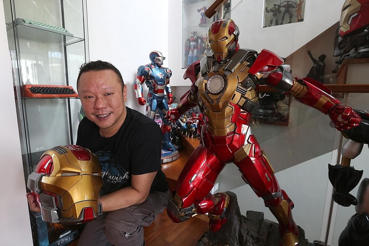 Mr Danny Lim with the Iron Man Mark 17 Heartbreaker model made by his company, Imaginarium Art.