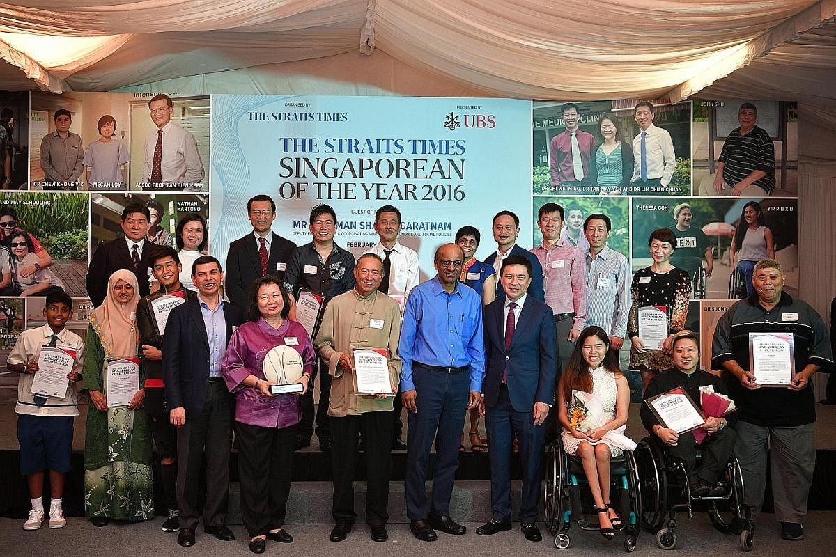 The finalists receiving a grand welcome at the awards ceremony yesterday. They were ferried by a fleet of 10 Land Rovers and two Jaguars, and greeted with a lion dance performance. Paralympians Yip Pin Xiu (left) and Theresa Goh with Dr Chi Wei Ming 