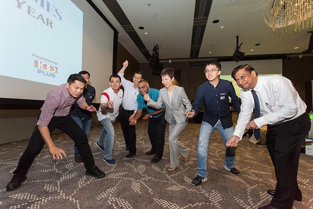 Culture, Community and Youth Minister Grace Fu sportingly engages in a mannequin challenge with some Straits Times readers during the ST Athlete of the Year award ceremony at the One Farrer Hotel & Spa Grand Ballroom yesterday.
