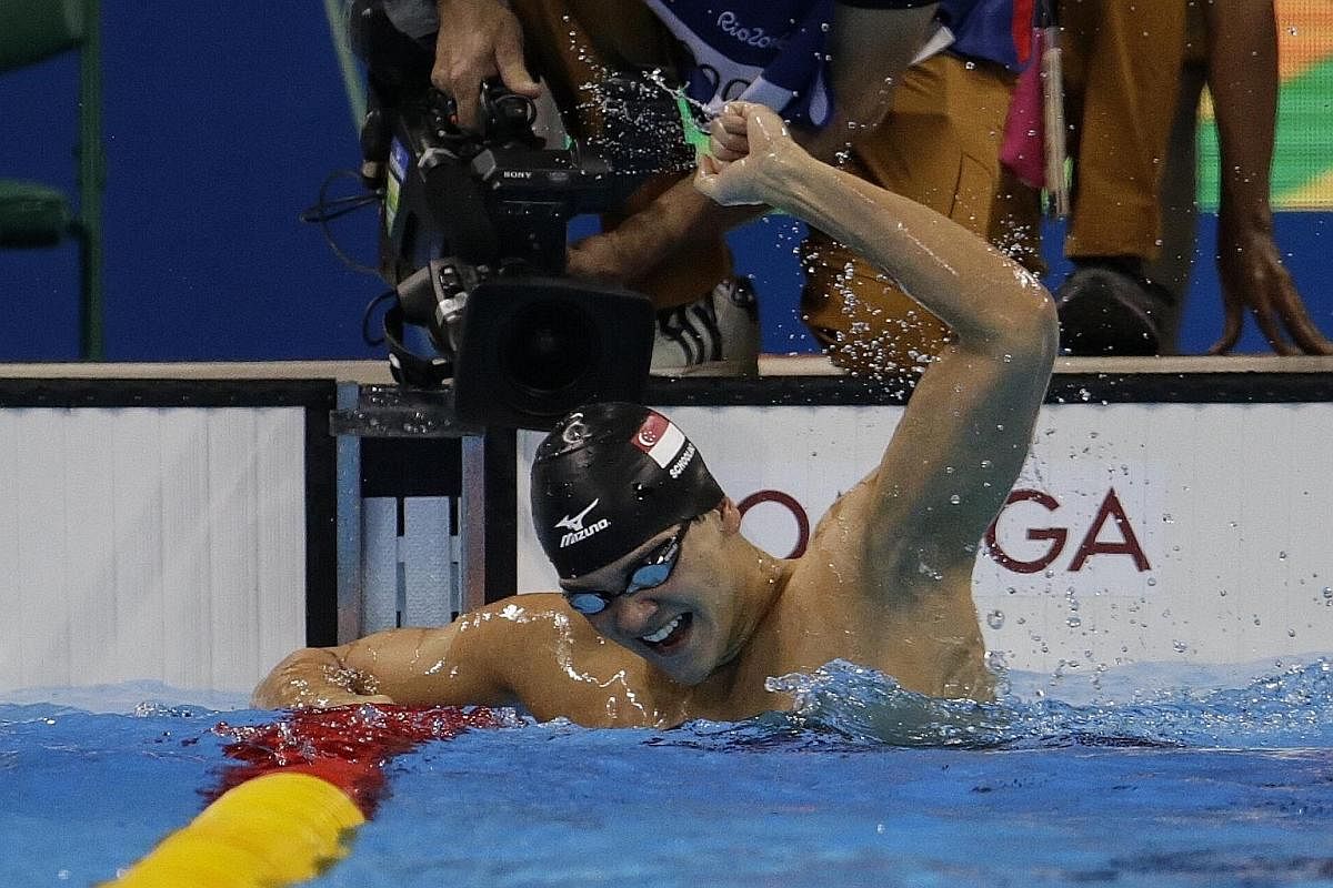 Joseph Schooling celebrates after winning the 100m butterfly gold medal at the Rio Olympics last year. The swimmer is the first person to win the title of The Straits Times Athlete of the Year more than once.