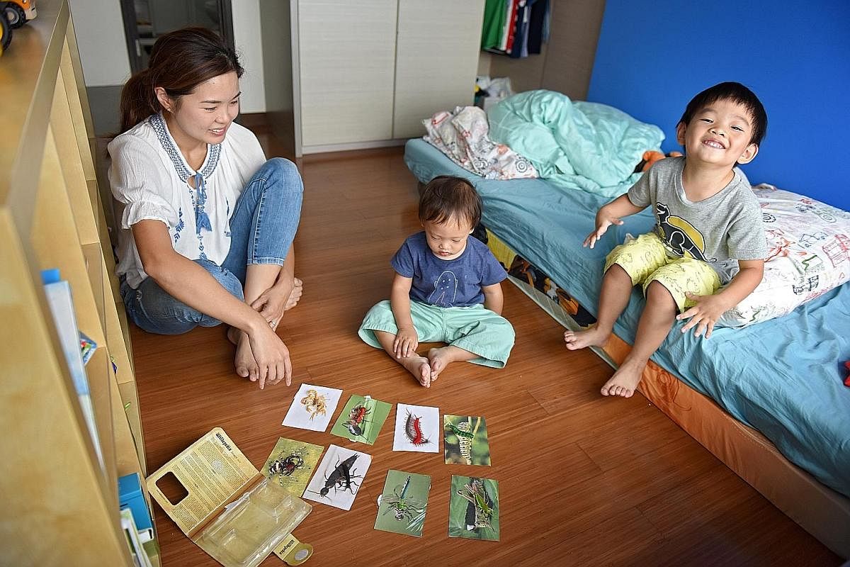 Stay-at-home mother Yang Jingyi believes in encouraging independence in her sons, Evan (centre) and Emmanuel.
