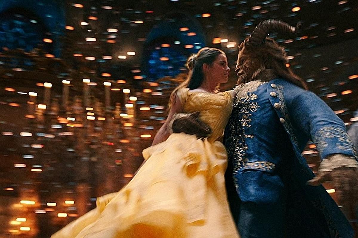 Emma Watson stars with Dan Stevens in Beauty And The Beast (above). The English actress hopes her Belle is a positive female role model, just as the 1991 movie character was for her when she was young.
