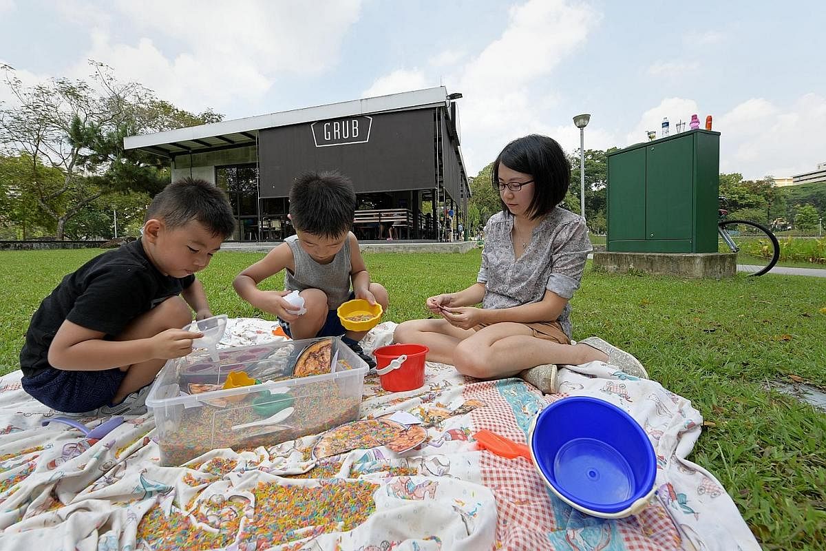 Grub at Bishan-Ang Mo Kio Park hosted several play events for kids. Here, a programmme facilitator watches the kids while they play. Montreux Jazz Cafe (above) has programmes run by a children's entertainment agency, while The Fullerton Hotel (left) 