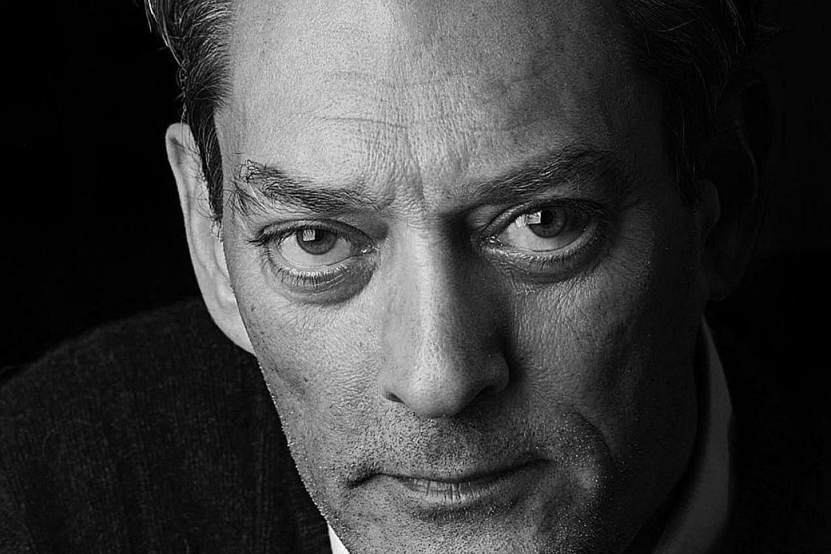 4 3 2 1, an 866-page tome, is the 17th novel of Paul Auster (left).