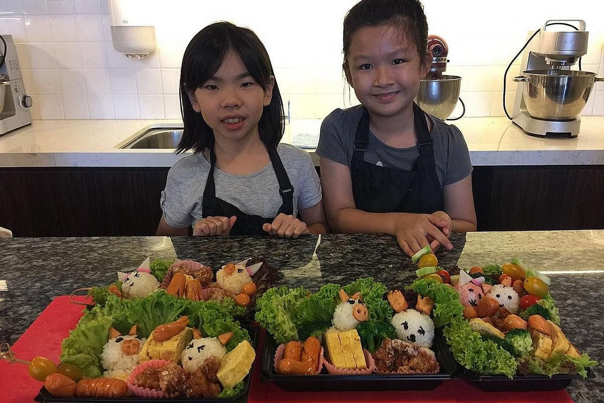 The Little Things' teacher Valerie Lee with (from left) Nadia Siyu Bres, six, Dorsher Ng, eight, Giselle Ng, nine, and Chloe Teo, seven. Palate Sensations Cooking School has a variety of kids' programmes.