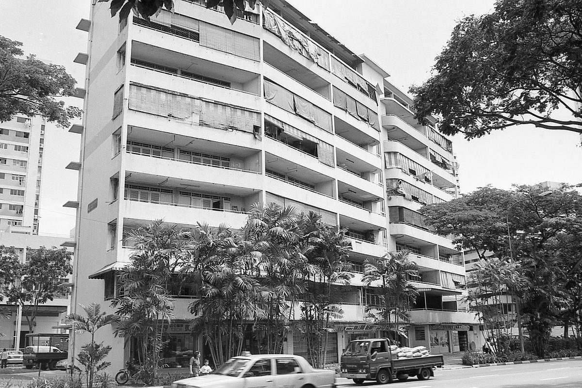 This public housing block at Upper Pickering Street (above) has been torn down, but was captured on film by hobbyist photographer Koh Kim Chay.
