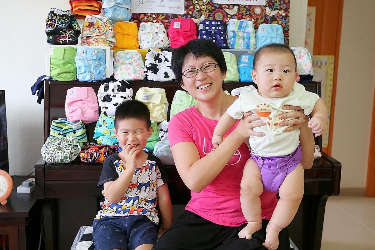 For Ms Irma Niza Jamal and her husband, Mr Mohammad Khirruddin Ismail, cost savings and attractive designs are main draws for using cloth diapers on daughter Eesha Naira.