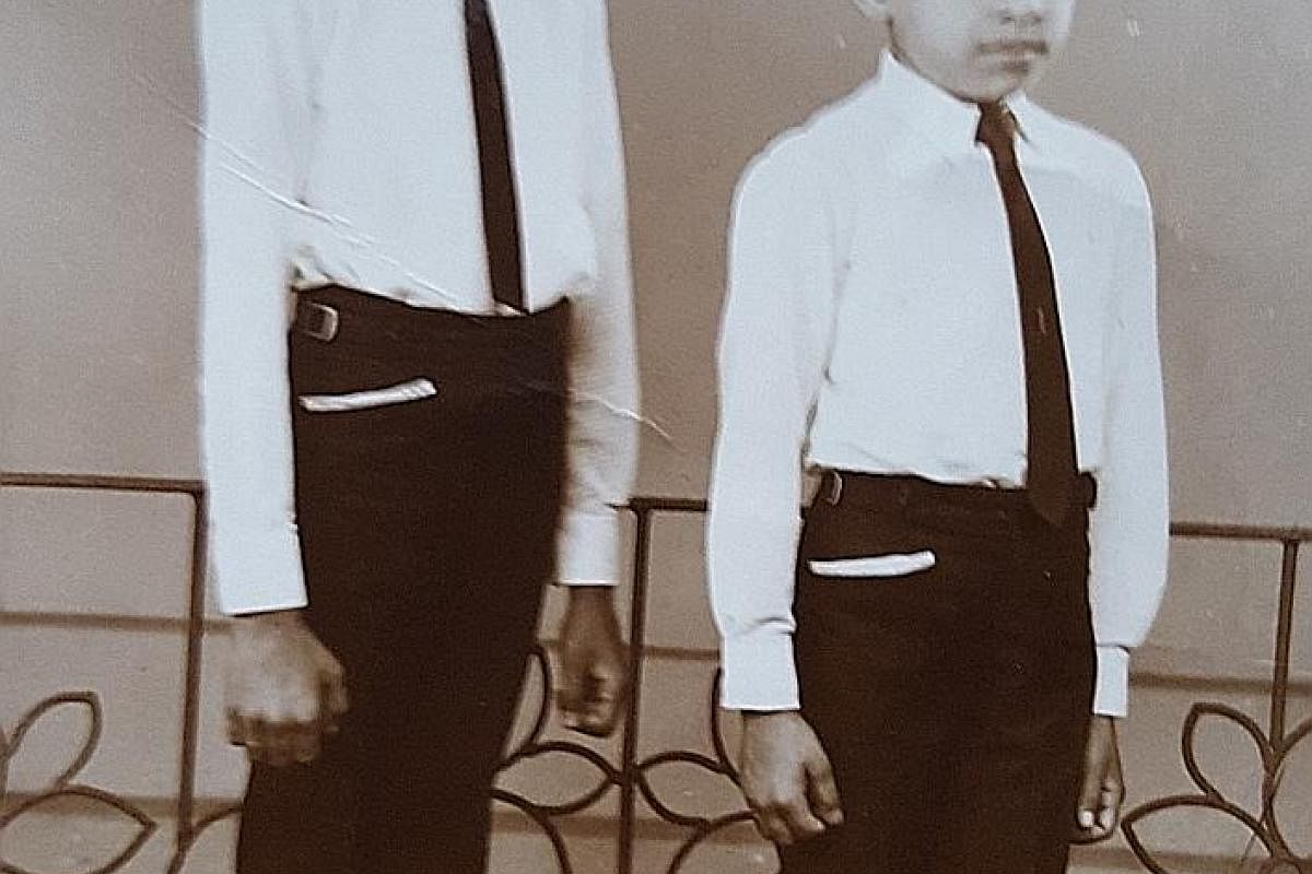 My life so far: Mr Fazal and his younger brother in a photo taken around 1973. 