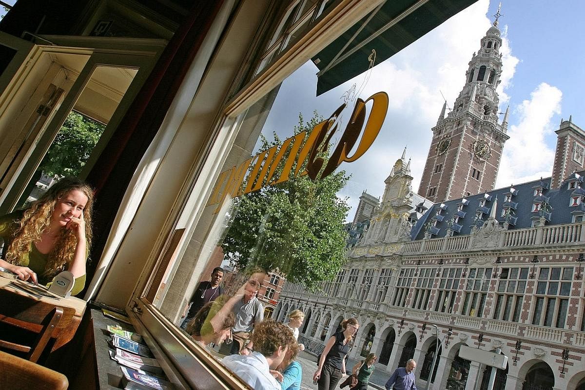 View of the University of Leuven's Central Library from a streetside cafe.
