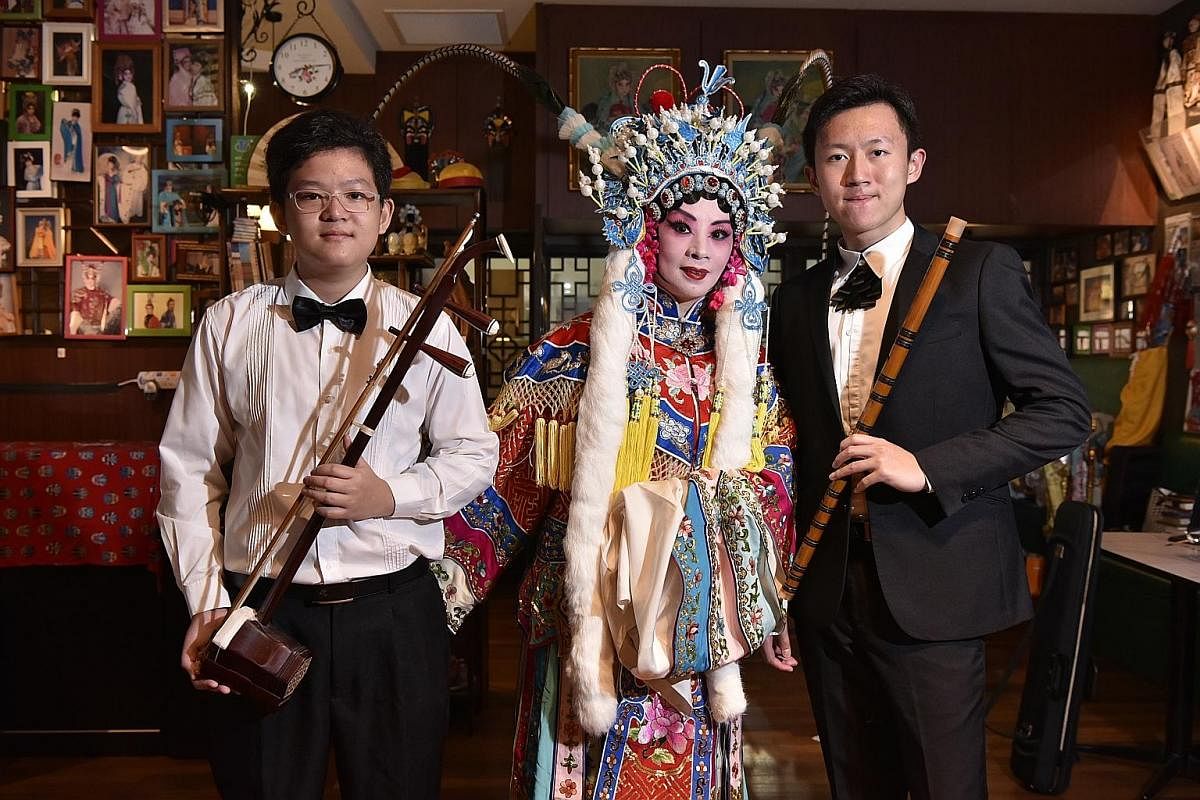 Peking opera singer Huang Ping hopes to take the stage with her sons Bian Tong (right) and Bian Chang one day.