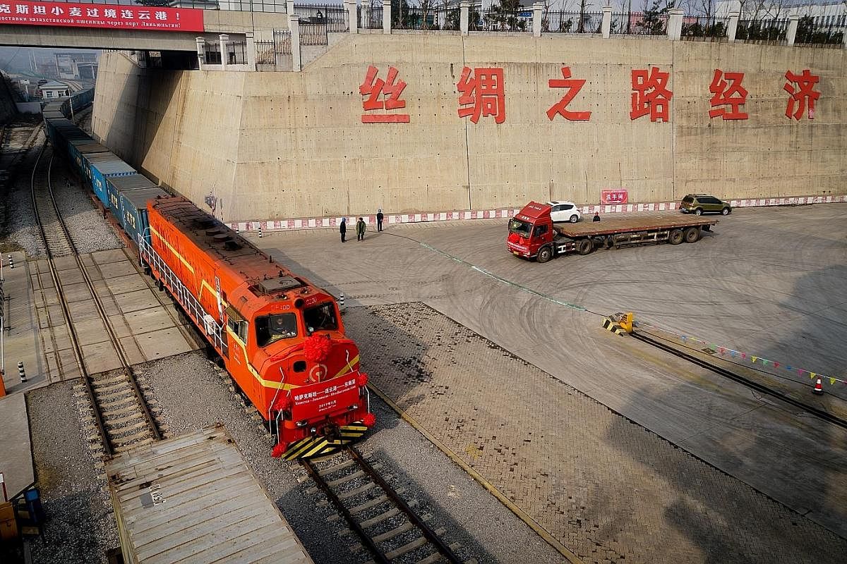 A freight train from Kazakhstan, carrying wheat, arriving at the China-Kazakhstan Lianyungang Logistics Cooperation Base last week. The shipment will be repackaged in China and transported to Vietnam by sea.