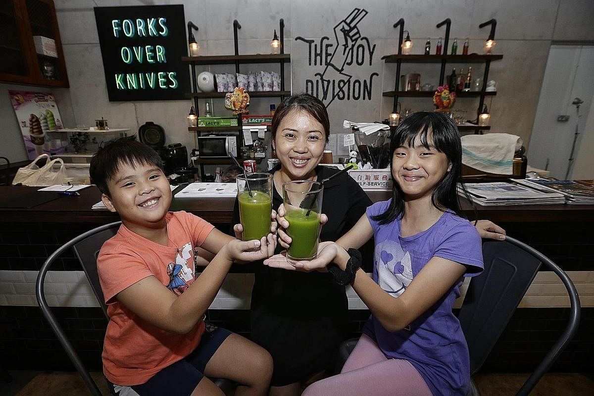 Ms Praise Phuan, 38, cold-presses fruit juices but adds vegetables to the mix for her daughter, Yenise Chia, 11, and son Goderick, nine.