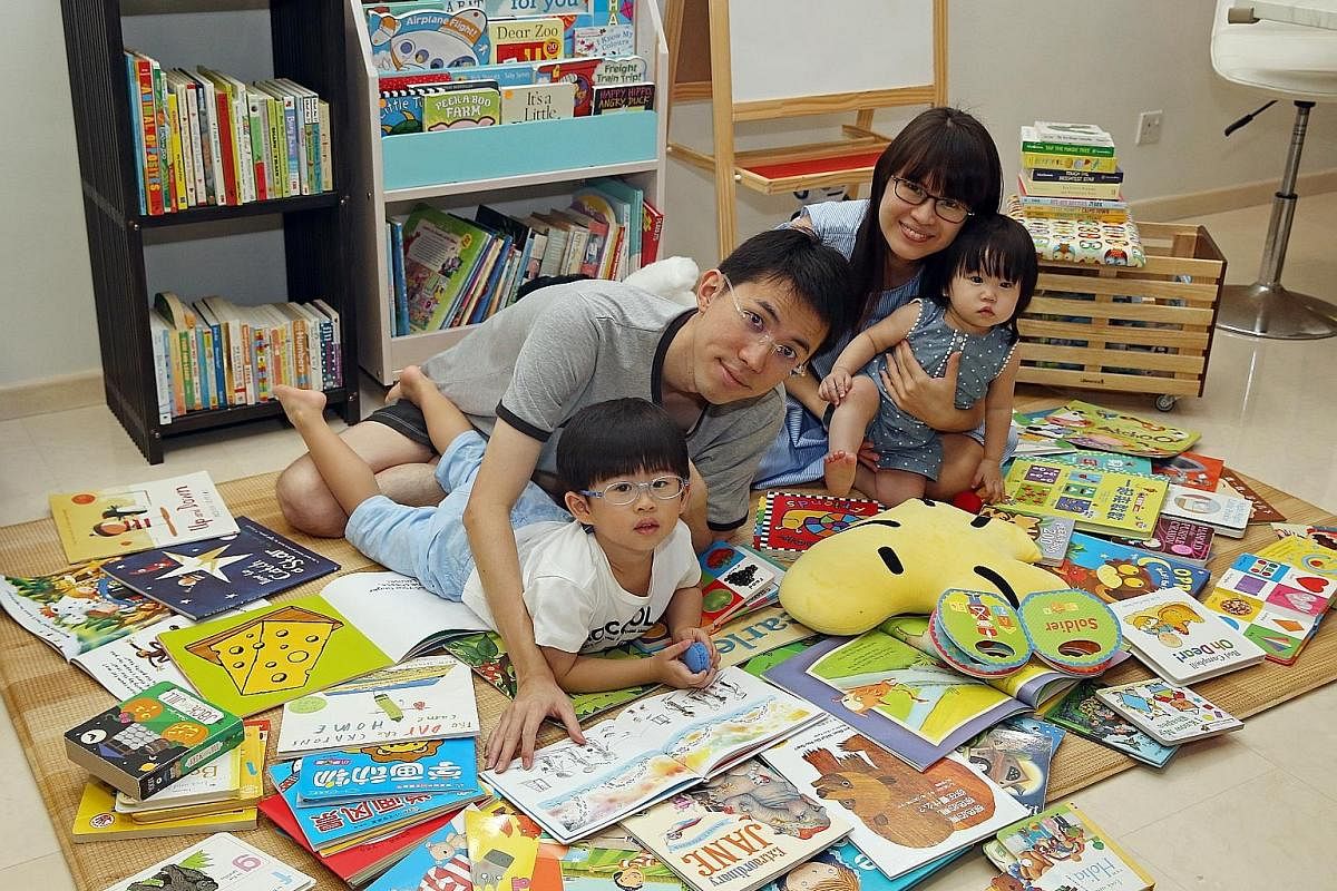Mrs Tiffany Lim with her husband, Paul, 30, and children Chloe, three, and Joash, one. She has been buying books for her kids online in the past year. Mrs Melissa Lee with her husband Lee Chien Herr, 36, and their children Ryan, three, and Renee, one