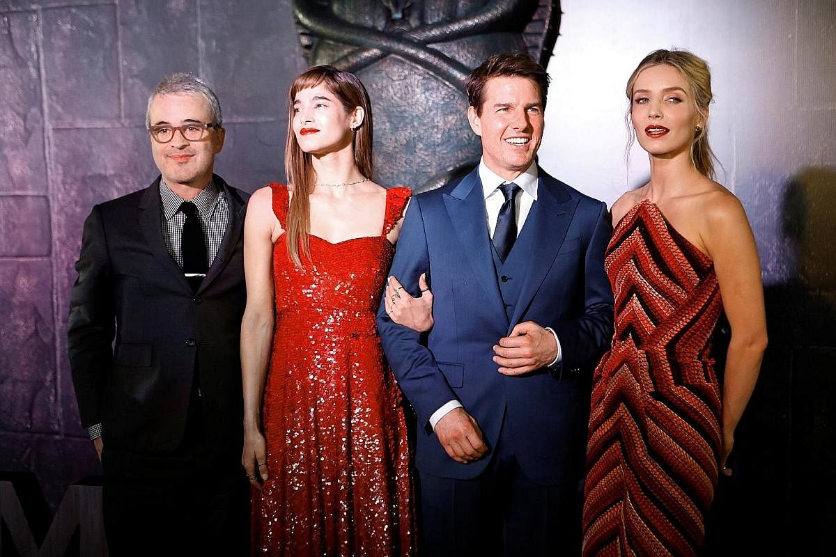 (From far left) The Mummy's director- producer Alex Kurtzman and cast members Sofia Boutella, Tom Cruise and Annabelle Wallis. To open in Singapore tomorrow, The Mummy (above) is based on a series of horror films featuring mummified corpses from anci