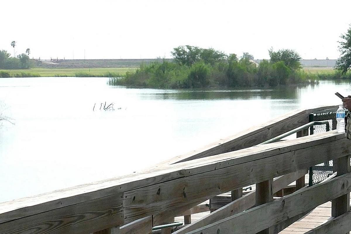(Above) The wall would have to be built on the American side of the Rio Grande river, which means it will slice through privately owned land. (Left) A rope ferry at the town of Los Ebanos in Texas that plies both sides of the river.