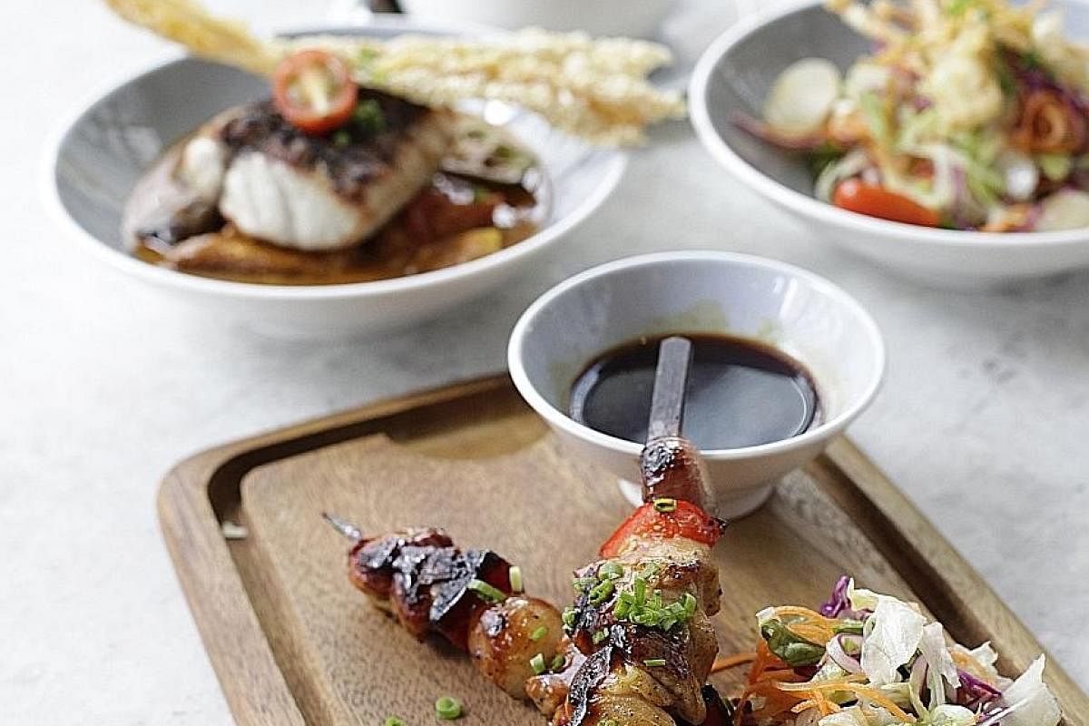 Unlisted Collection's founder Loh Lik Peng and chef Clayton Wells (far right) of Automata in Sydney are partnering to open restaurant-bar concept Blackwattle in September. Grilled chicken skewers with gong bao sauce is one of the dishes in the newly 