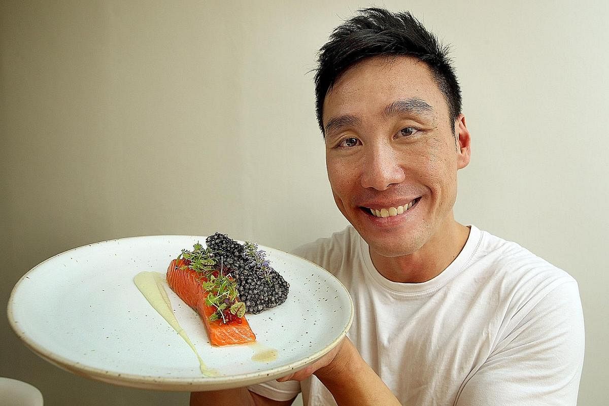 Mr Chia Wee Loon plated his spiced salmon trout confit dish with a squid-ink sago chip.