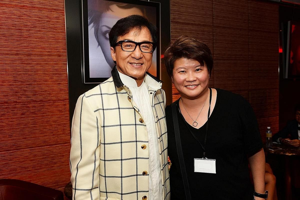 Above: Ms Joyce Lee, aged 14, at home in Choa Chu Kang; and with Jackie Chan (right), at the Dragon Blade Star tour in 2015. Ms Joyce Lee sees her cars as a reminder of her less privileged background and the financial targets she had set for herself 