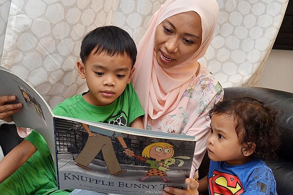 As part of her strategy to teach her sons Adyan Darius Juffrey, six, and Adam Mika Juffrey, three, to read, Ms Shamsiah Samsudin reads their favourite books to them repeatedly.