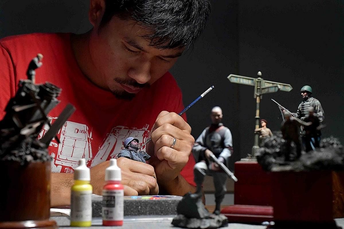 Mr Calvin Tan, 41, is not only a World War II buff but also a world-renowned miniature figure sculptor and painter. The winner of many overseas awards is also an author and recently produced a videoon the art of miniature figure painting. It can take
