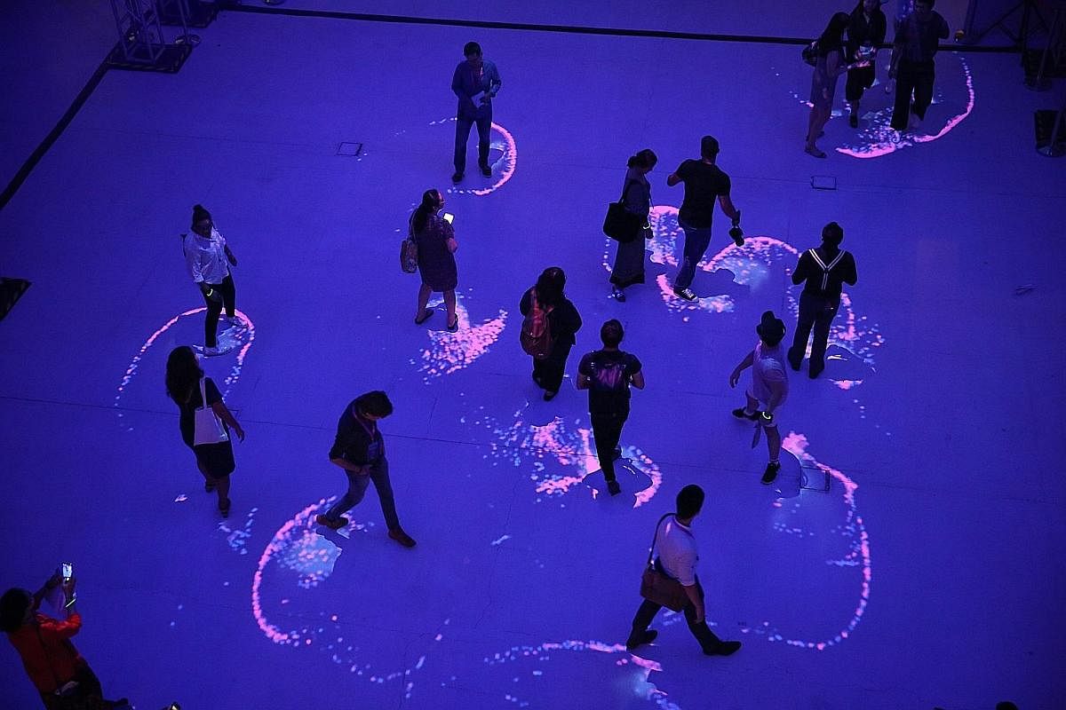 Another exhibit at the festival is Flock, an interactive light installation which turns the spotlight on pedestrians, co-opting them into the performance. Visitors can interact with 16 human-sized figures at the Les Hommes Debout (The Standing Men) e