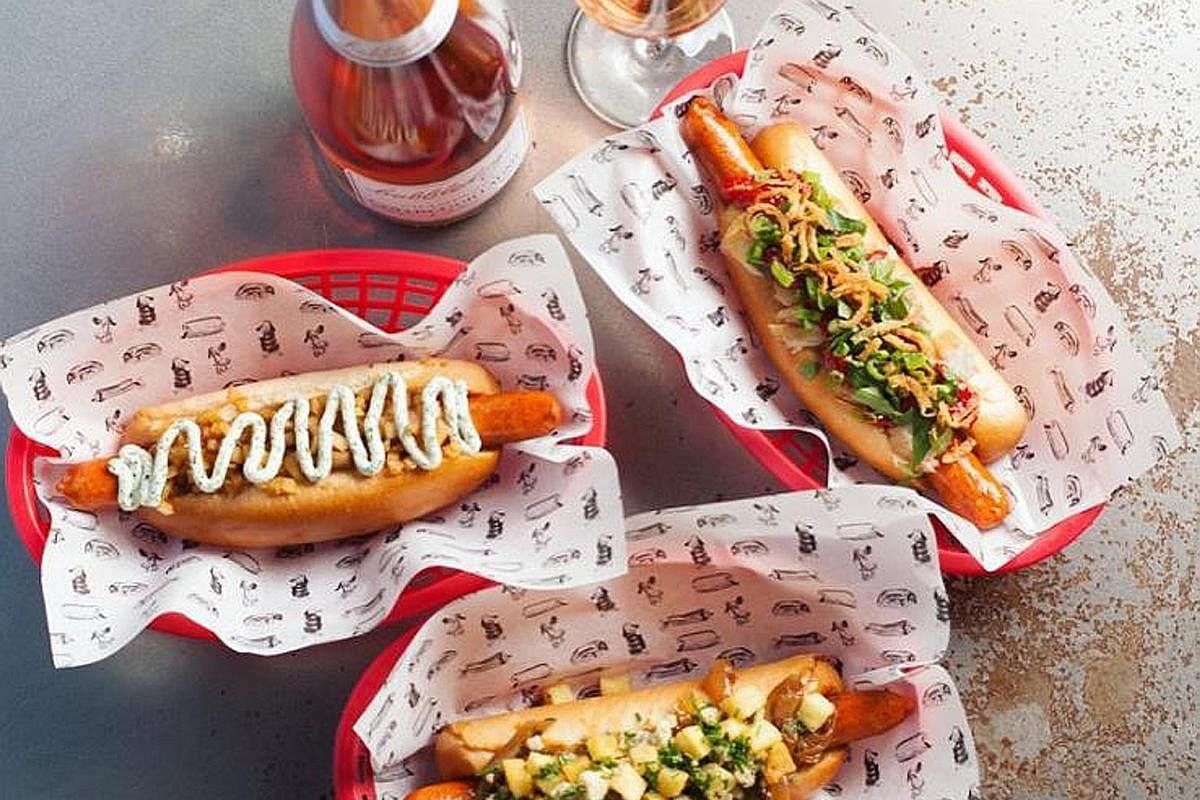 London's fizz bar Bubbledogs pairs top champagnes with elaborately topped hot dogs.