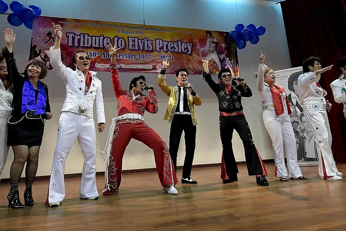Above: Tribute artists from the Elvis singing group at Thomson Community Club taking to the stage during the finale of the performance, to belt out Viva Las Vegas. Below: Each Elvis tribute artist takes along his video CD collection of Presley songs 