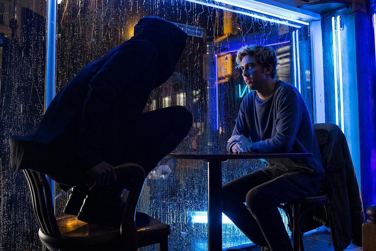 Keith Stanfield (left) plays detective L and Nat Wolff stars as college student Light, who possesses the titular notebook in the Death Note remake.
